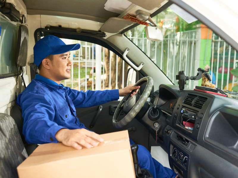 courier driver delivering parcel
